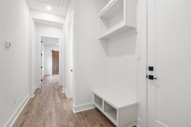 mudroom with hardwood / wood-style floors