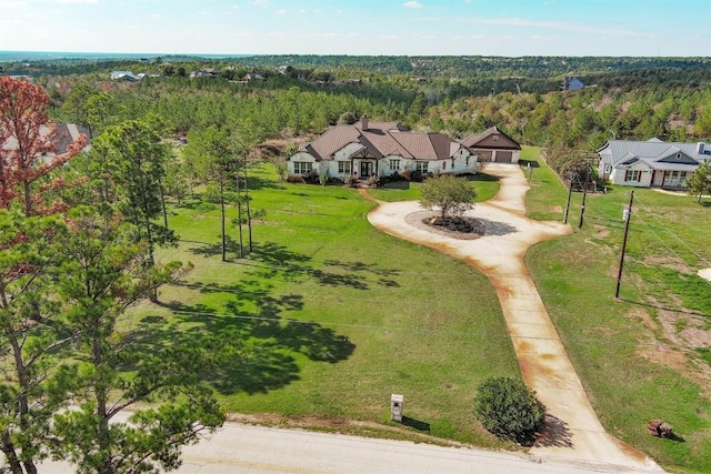 bird's eye view with a forest view