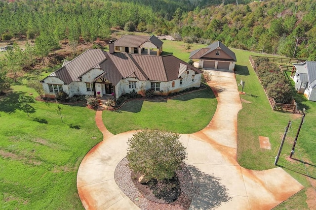 aerial view with a wooded view