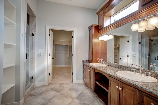 bathroom with vanity and an enclosed shower