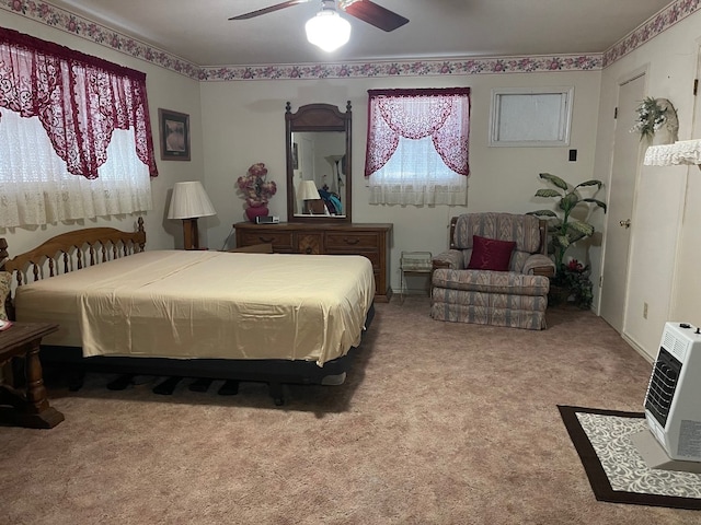 bedroom featuring light carpet and ceiling fan