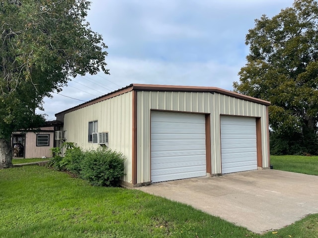 garage with a lawn