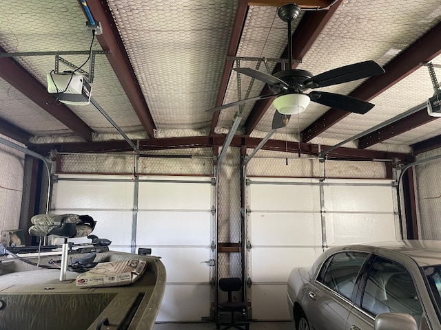 garage featuring ceiling fan and a garage door opener