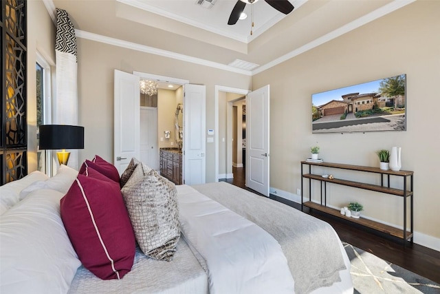 bedroom featuring a raised ceiling, baseboards, crown molding, and dark wood-style flooring