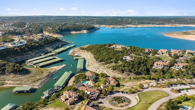 bird's eye view with a water view and a residential view