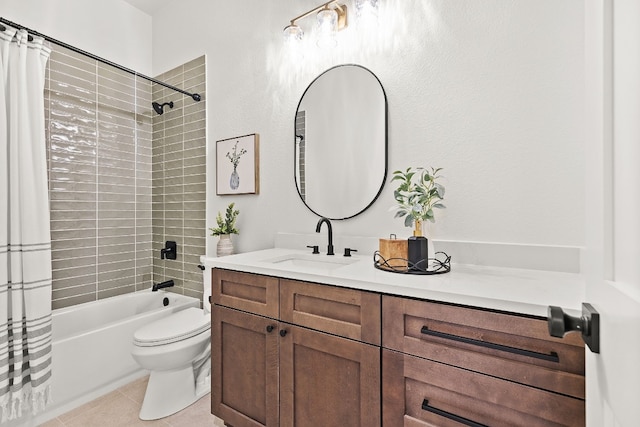 full bathroom featuring tile patterned flooring, vanity, toilet, and shower / bath combo with shower curtain