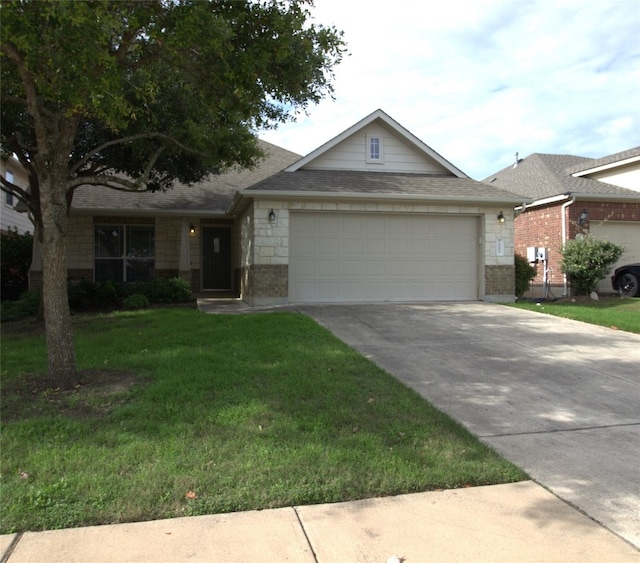 ranch-style home featuring a front lawn and a garage