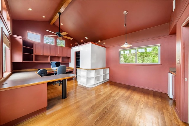 home office with built in desk, high vaulted ceiling, beamed ceiling, ceiling fan, and light wood-type flooring