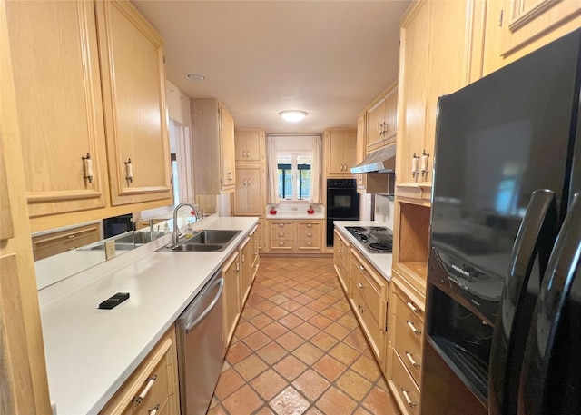 kitchen featuring black appliances, sink, and light brown cabinetry