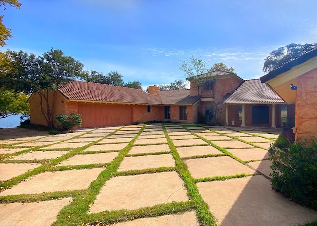 view of front of house with a patio area