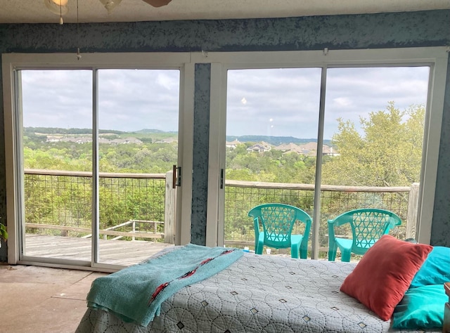 bedroom with multiple windows