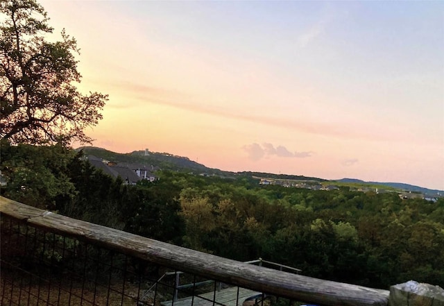 property view of mountains featuring a wooded view