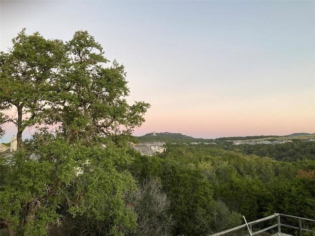 mountain view featuring a view of trees