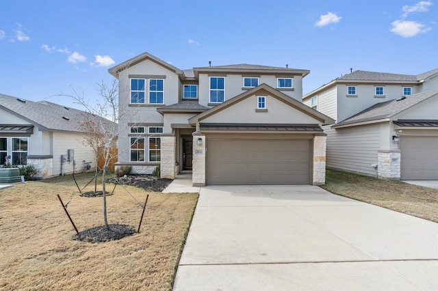 view of front of property with a garage and central AC