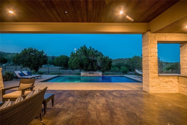 view of pool featuring a fenced in pool, a hot tub, a patio, and fence