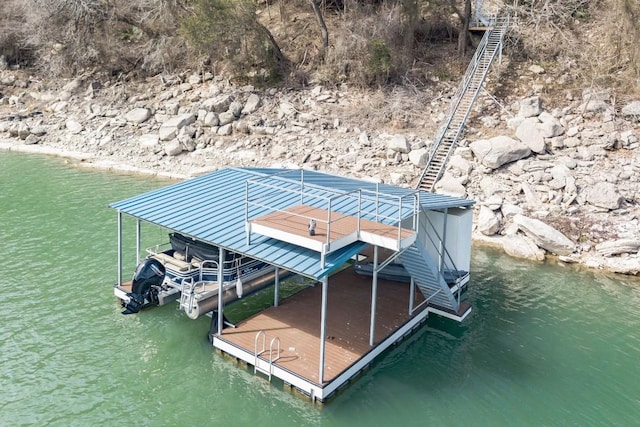 dock area featuring a water view