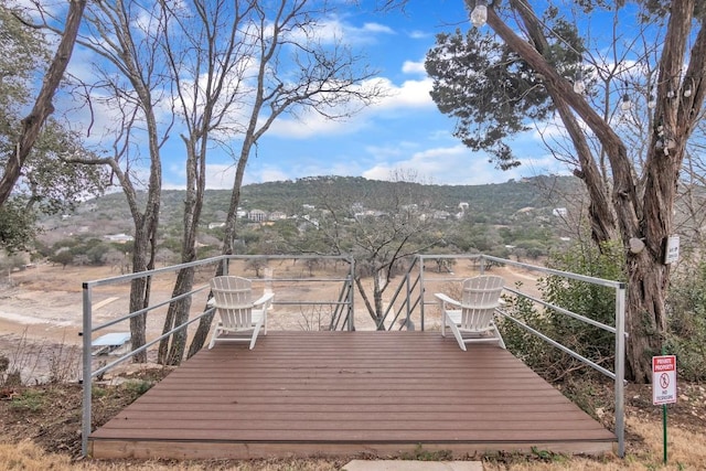 wooden terrace featuring a mountain view