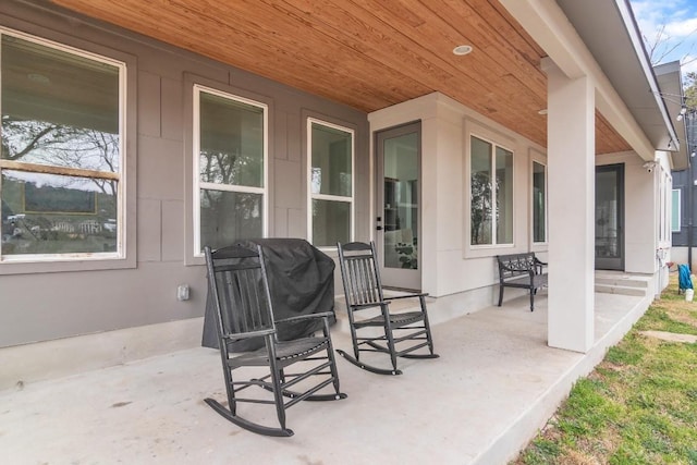 view of patio featuring a porch