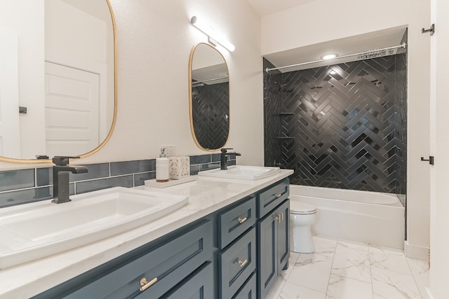 full bathroom featuring vanity, toilet, decorative backsplash, and tiled shower / bath