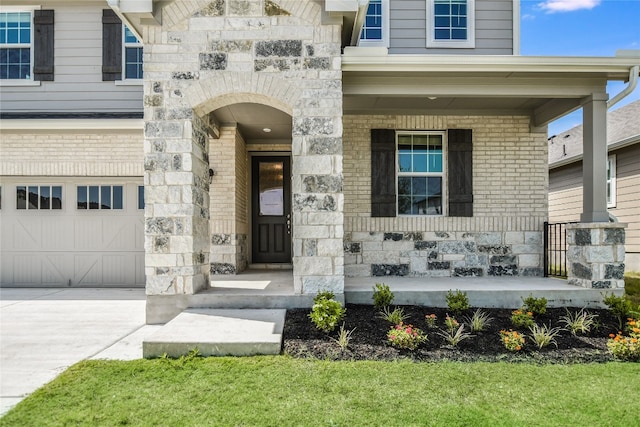 doorway to property featuring a garage