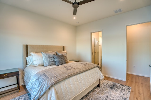 bedroom with ceiling fan and hardwood / wood-style floors