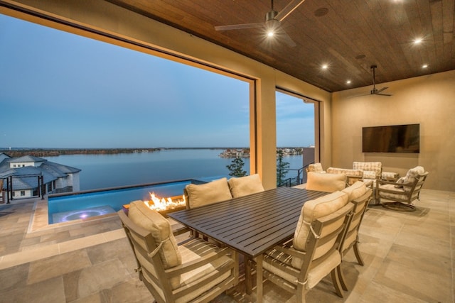 view of patio featuring an outdoor living space and ceiling fan