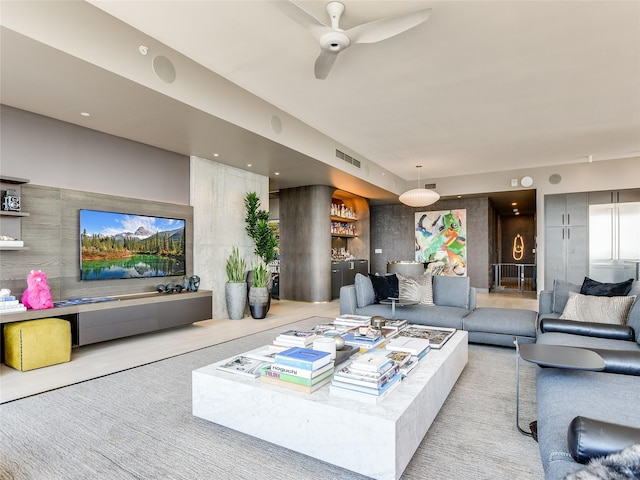 living room featuring ceiling fan