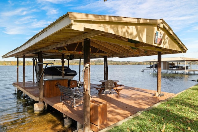 dock area featuring a water view