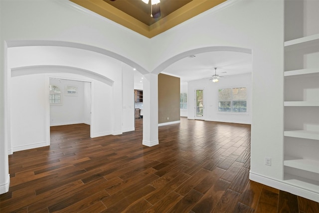 foyer featuring dark hardwood / wood-style flooring and ceiling fan