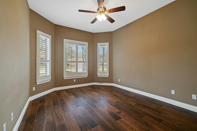 empty room featuring wood-type flooring and ceiling fan