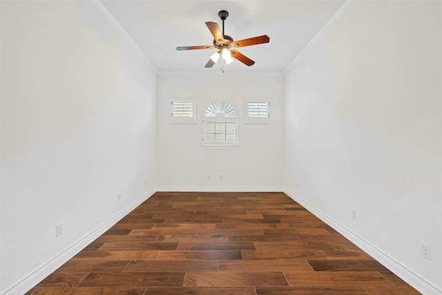 spare room with ornamental molding, ceiling fan, and dark hardwood / wood-style floors