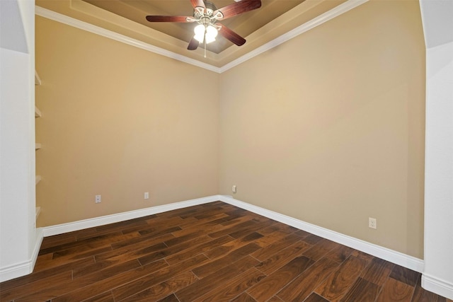 unfurnished room featuring ornamental molding, ceiling fan, and dark hardwood / wood-style floors