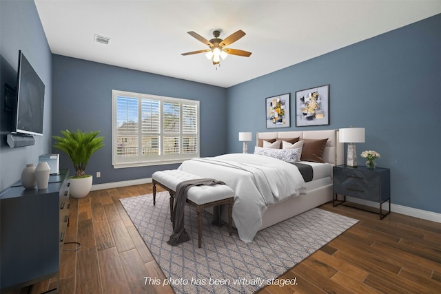 bedroom featuring ceiling fan and hardwood / wood-style flooring