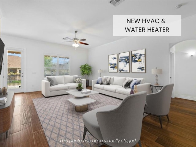 living room with hardwood / wood-style flooring and ceiling fan