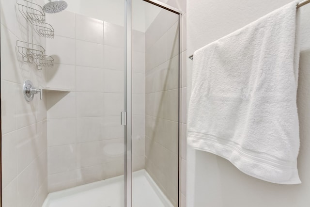 bathroom with a stall shower