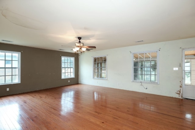 unfurnished room featuring wood-type flooring and ceiling fan