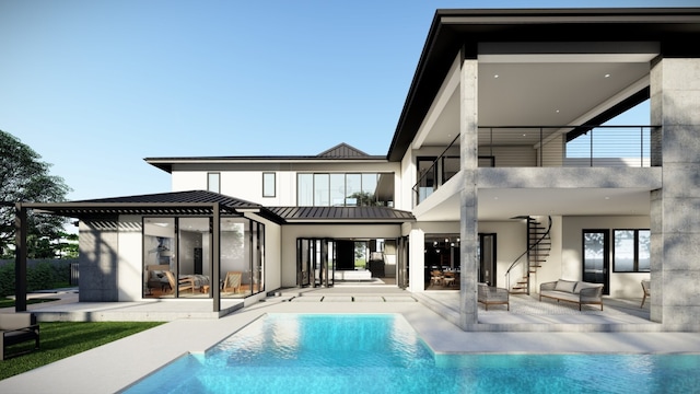 back of property with a standing seam roof, a patio area, stairway, and metal roof