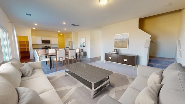 living room featuring light wood-type flooring