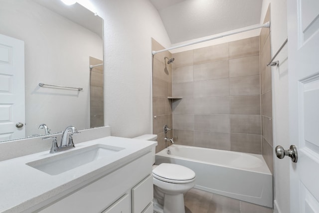 full bathroom featuring toilet, vanity, and shower / bathtub combination