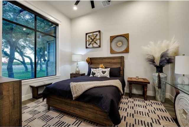 bedroom featuring ceiling fan and light wood-type flooring