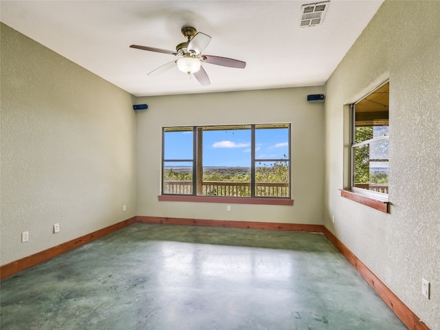 spare room with ceiling fan