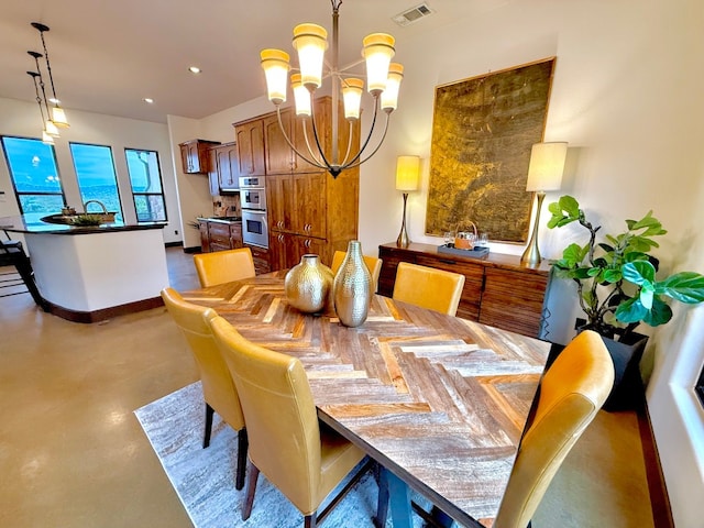 dining space with a chandelier