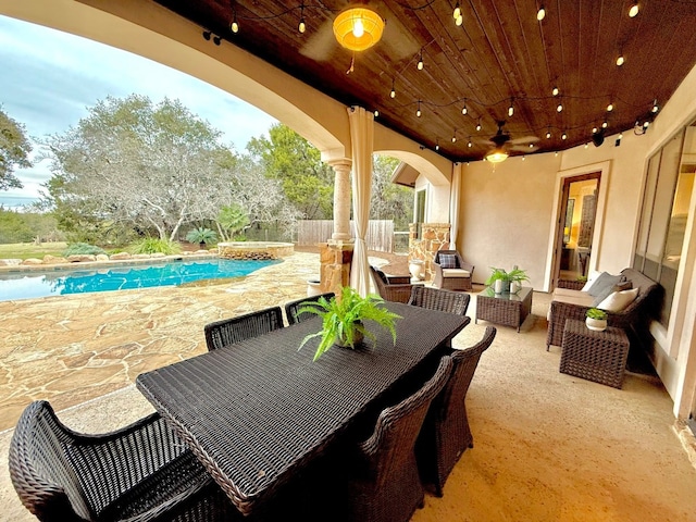 view of patio with an outdoor hangout area and ceiling fan