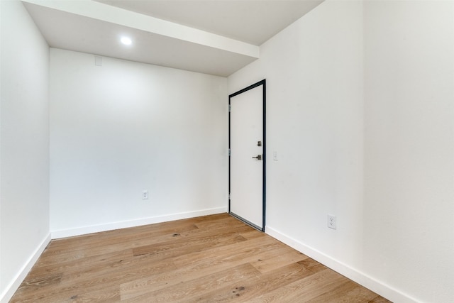 empty room with light wood-type flooring