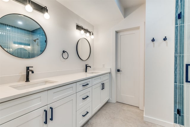 bathroom with vanity, walk in shower, and concrete floors