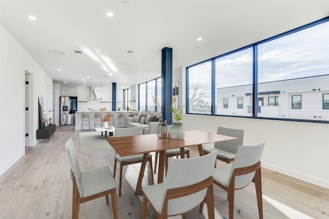 dining room featuring light hardwood / wood-style floors