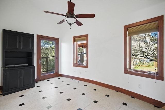 unfurnished room featuring ceiling fan