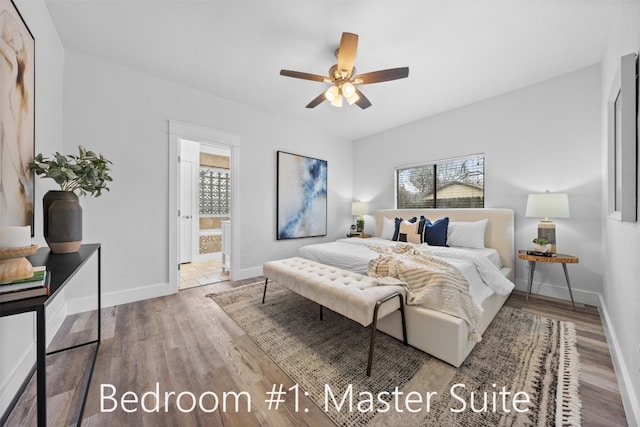 bedroom with ensuite bathroom, ceiling fan, and hardwood / wood-style floors