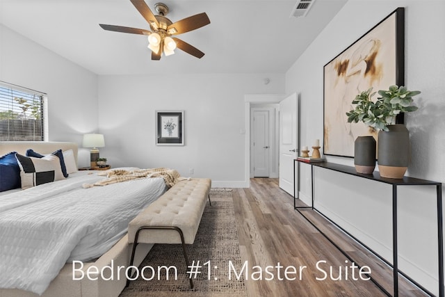 bedroom with ceiling fan and wood-type flooring