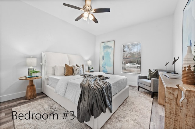 bedroom featuring ceiling fan and hardwood / wood-style floors